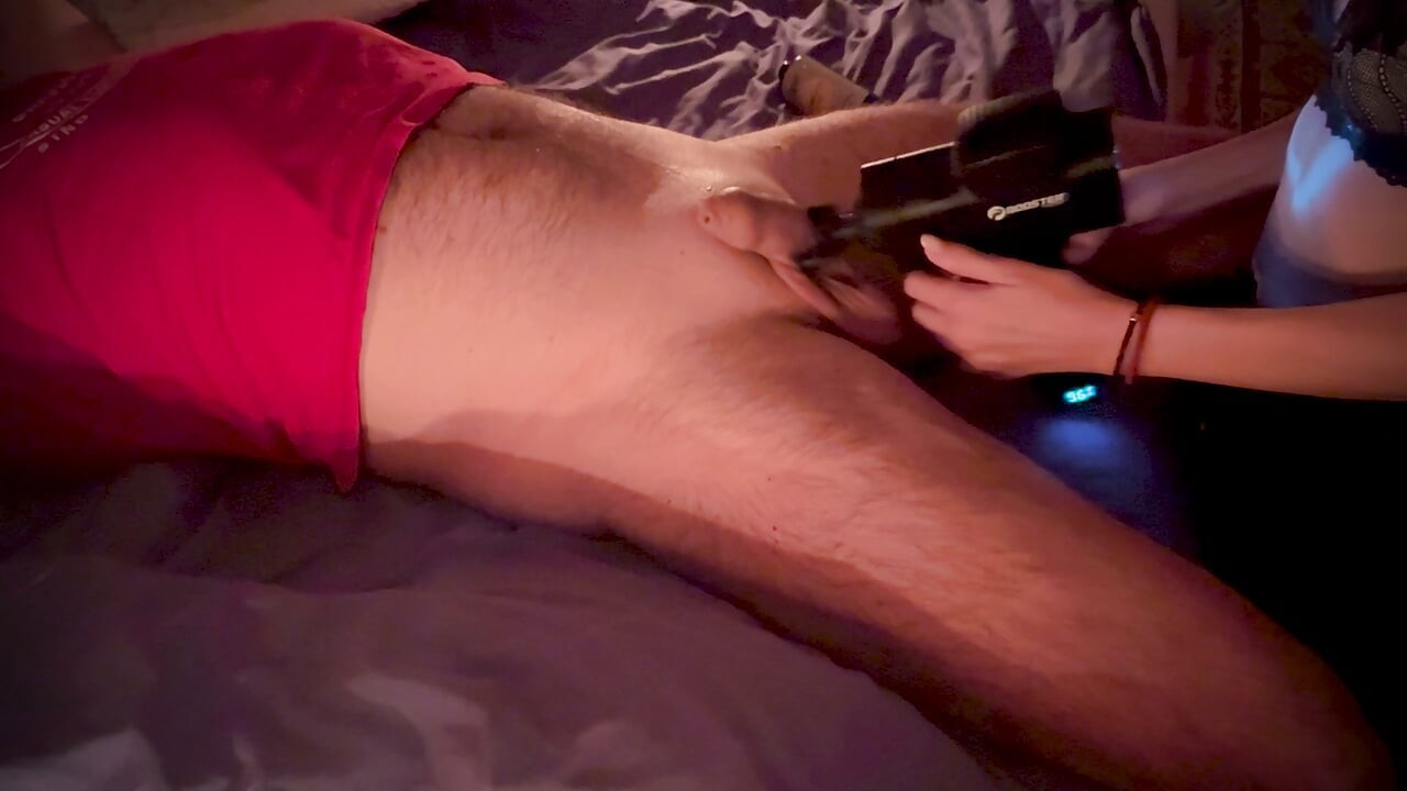 A pleasant evening massage of the testicles and penis with hands and a vibrator.