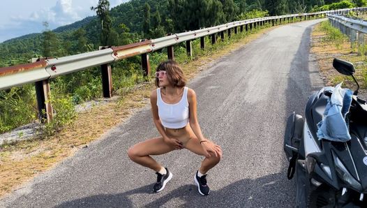 Travelling girl stops for a pee break