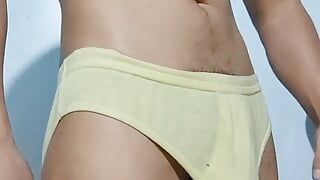 Horny gymnast stroking his huge throbbing cock in underwear