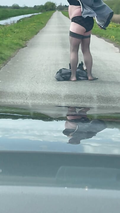 Crossdresser husband, outdoors after work flashing.