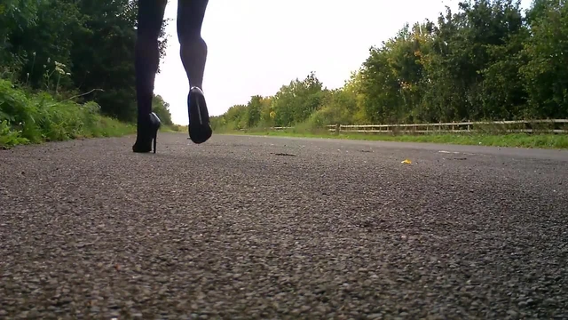 Walking in just black o paques and patent heels.MP4