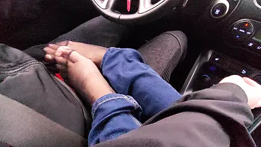 Amateur MILF in jeans and nylon socks gives a taxi driver a footjob