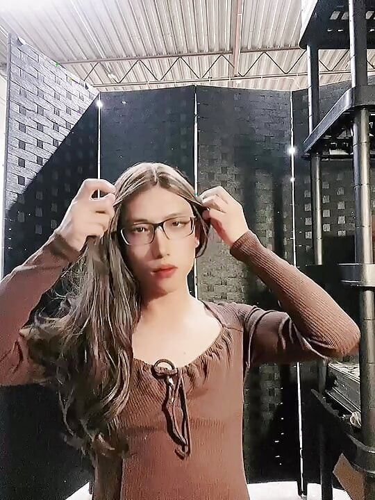 Asian CD Eva in brown dress and grey pantyhose