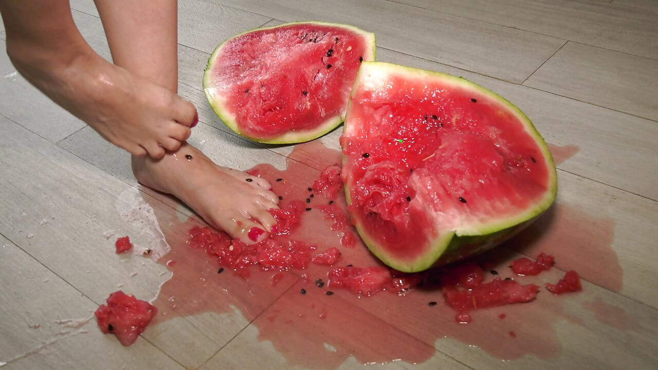 Busty MILF Presents Her Feet and Plays with a Watermelon