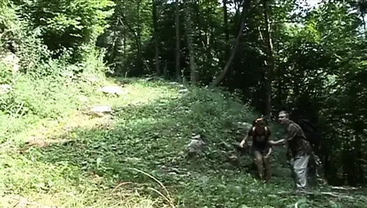 Naughty teen gets fucked by a mature guide in the woods