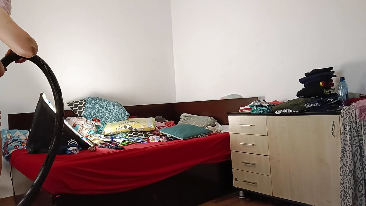 Amateur wife vacuuming in the bedroom. Amateur wife gives me a handjob until I cum.