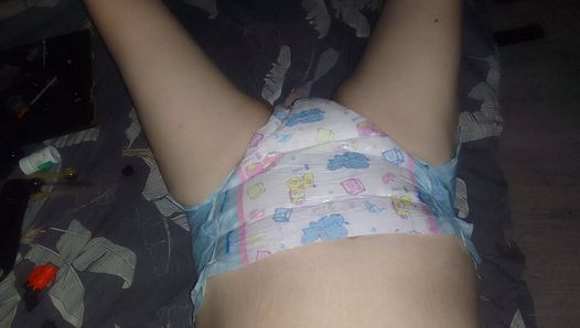 Chubby diaper boy pleases himself