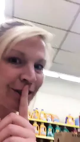 Hot mature lady flashing in the store