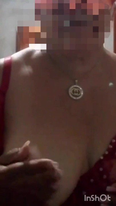 Key moment from "Widowed grandmother sends a video to her lover touching her tits"