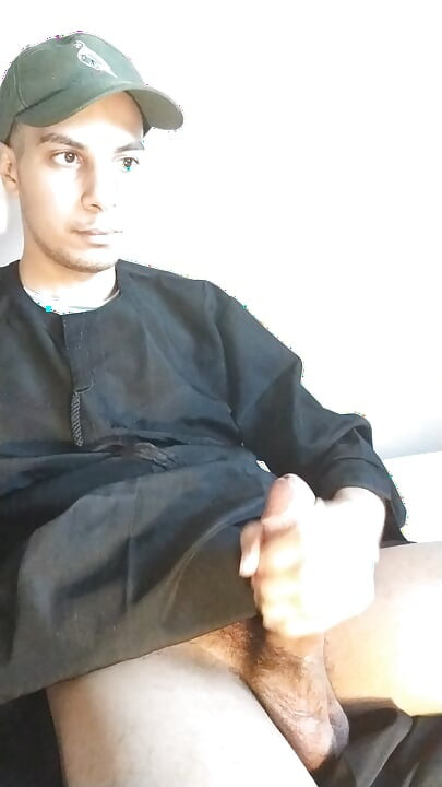Arab daddy with a mustache shakes his big cock