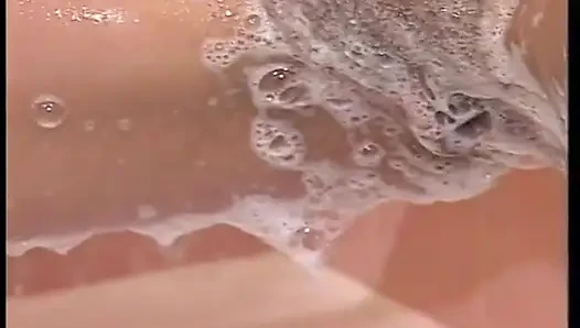 Hairy MILF slut masturbates under shower