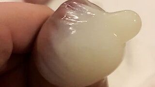 Big cumshot in condom