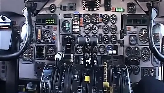 Randy pilot fondles sexy brunette in the cockpit