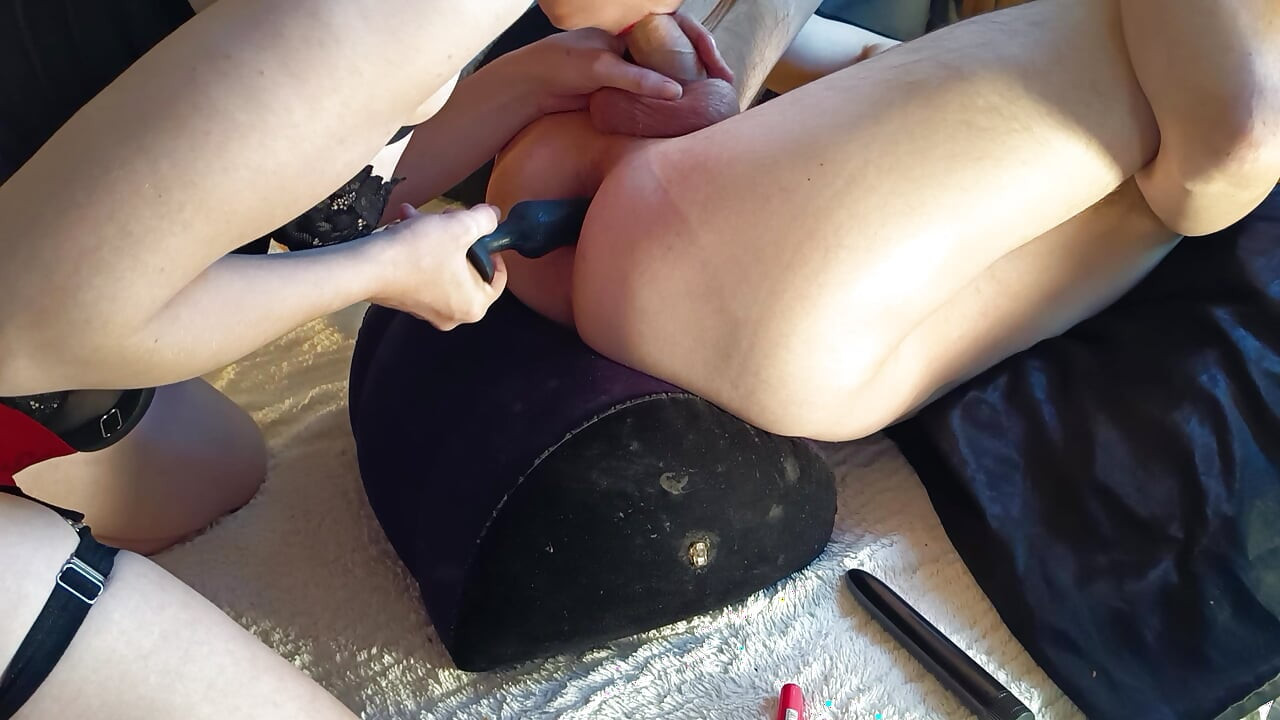 She dildos me, fingers me and takes my ass with a strap-on dildo