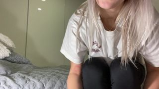 Cute girl sniffs her own shoes and nylon socks