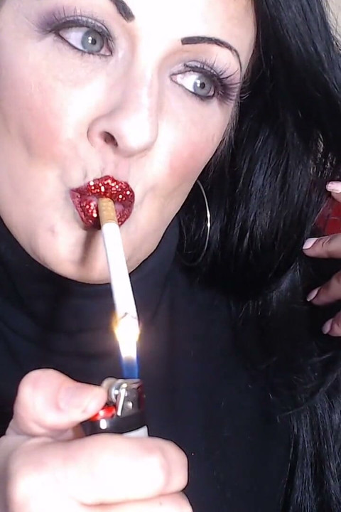 Closeup smoking red glittered lipstick