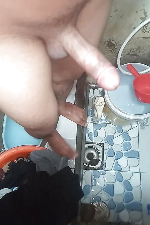 takes a shower and masturbates