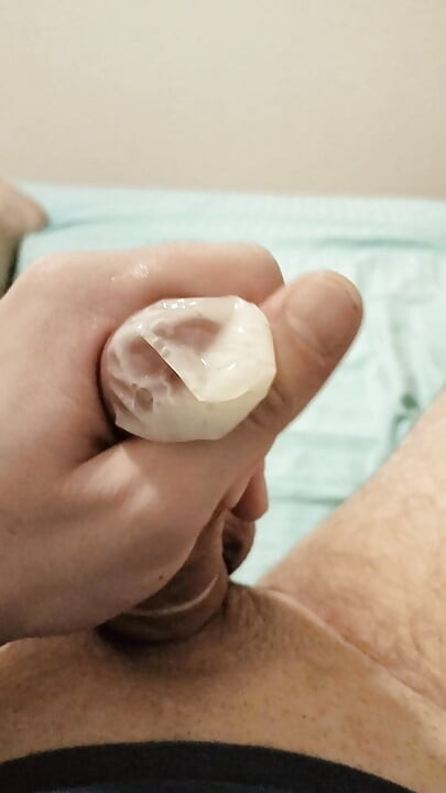 Jerking my dick and cum in a condom