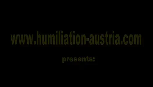 Sucking her strapon dildo