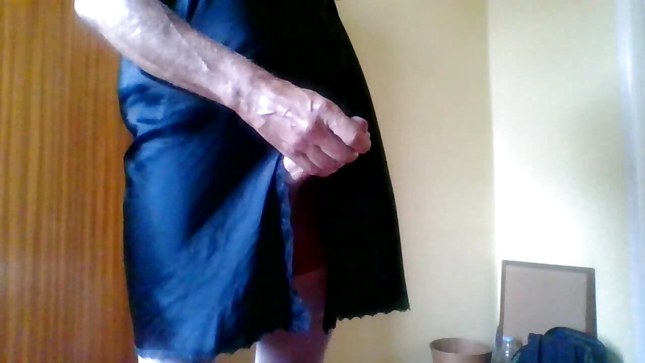 Another wank in cream stockings and suspenders