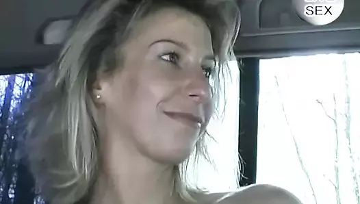 A stunning-looking German blonde gets her shaved cunt dildoed in the car