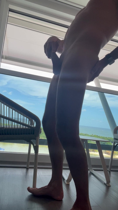 Jerking off on cruise ship balcony while leaving port