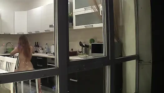 Redhead Amateur Doesn't Know That She Is Being Watched While Dancing in the Kitchen