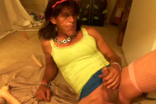 Crossdresser hits bladder with dildo and strikes gold