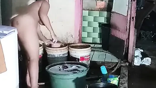 Washing clothes while naked