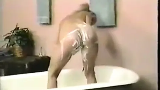 Sexy dirty blond whore takes bath in chocolate sauce and whipped cream