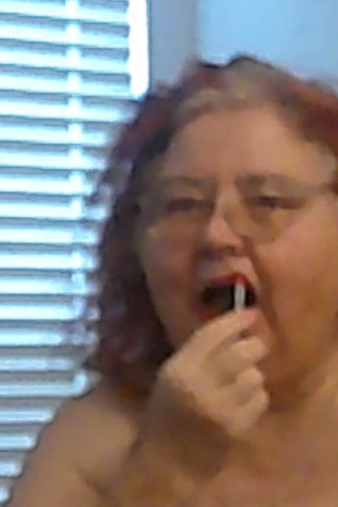 Mature BBW Redhead Nurse Vicki Talks to You as She Makes a Lipstick Applying Video for You!