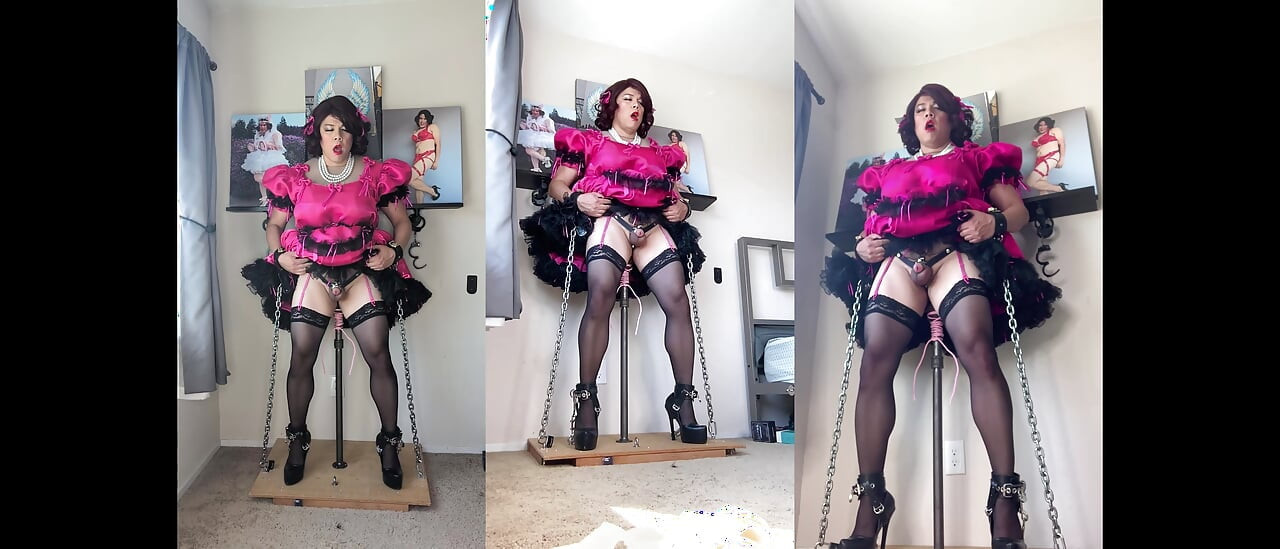 粉色娘娘腔女仆candy被锁在她的假阳具架上并骑乘她的杆子