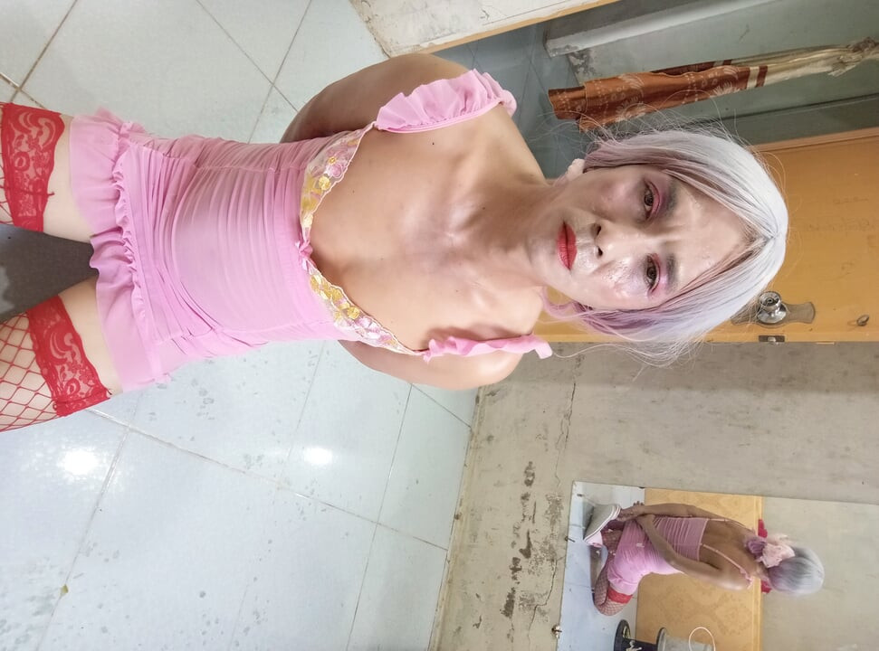 Oanh Le transgender wearing sexy and pornographic clothes standing and screaming is extremely happy