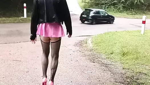 Sissy plays the whore under the rain