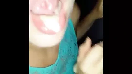 Girlfriend has lots of fun blowing strangers in the booth