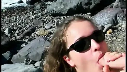 Curly-Haired teen sucks older guy's cock at the beach then fucks