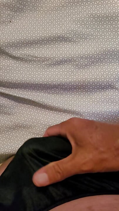 Masterbating in black nylon panties.