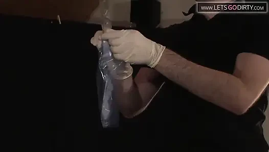 Milf moans as pussy is injected during catheter insertion