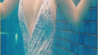 Wifey stuns everyone in amazing hot one piece bathers and flashes her perfect tits.