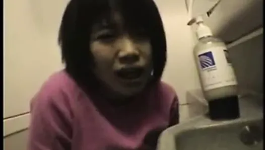 Asian Girl Masturbates in Airplane Bathroom