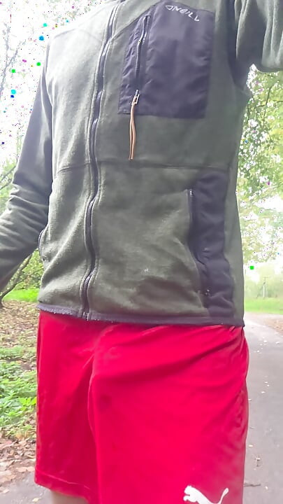 Skinny boy shows his cock in public. Cum drips on the street before leaving huge piss