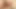 Redhead ladyboy Pinky strips black dress and strokes her