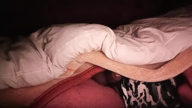 A Indian boy was fucking herself at midnight on bed