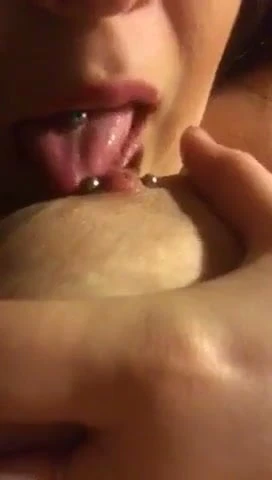 Licking and sucking pierced nipple