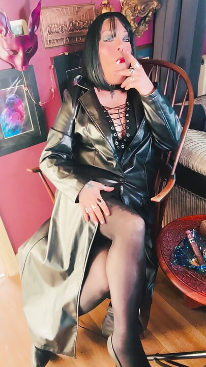 Your Favourite Smoking Queen Dressed In A Full Length Leather Coat, Pantyhose & High Heels Smokes A Cork 100 Cigarette For You