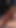 Key moment from "Behind the scenes turns into a lesbian pussy eating scene with small titty babes"