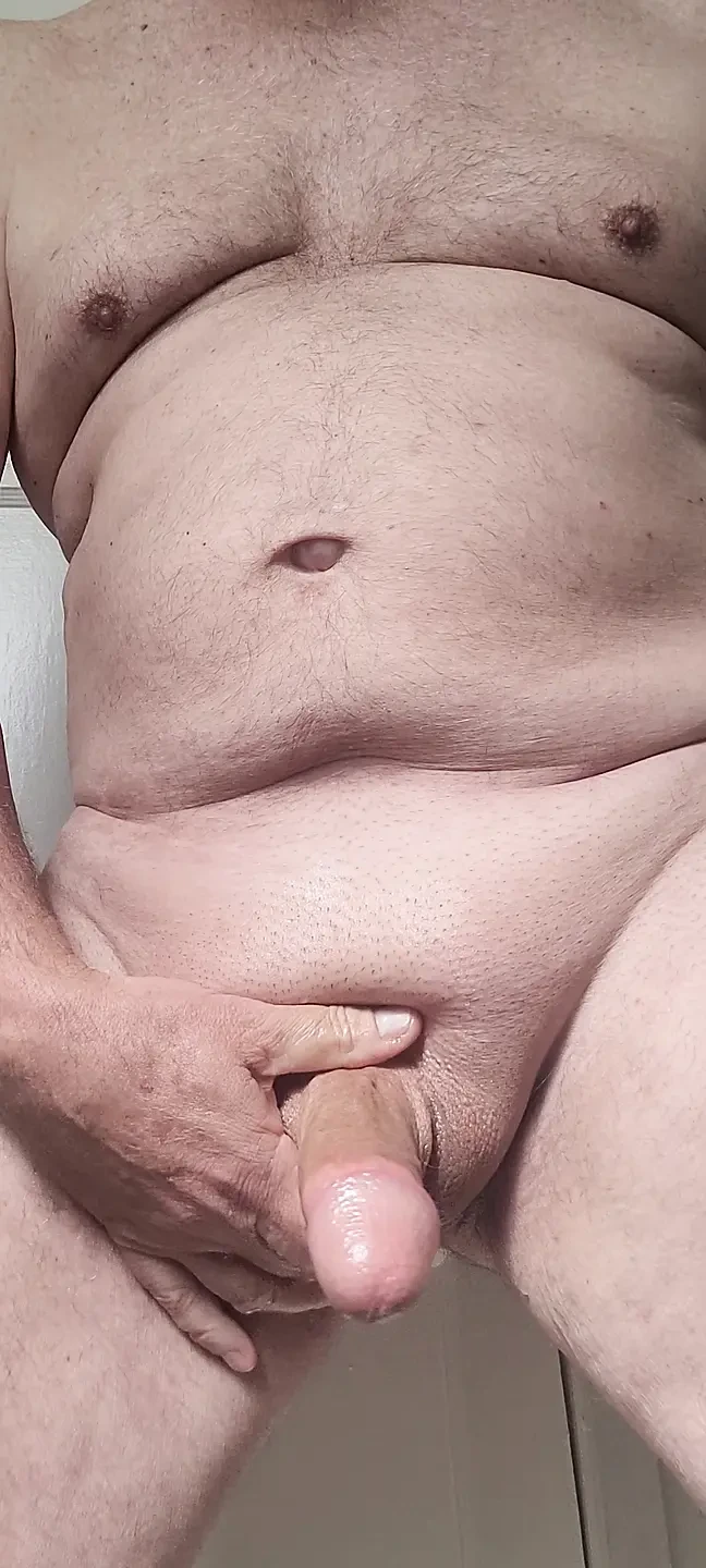 Solosexual strokes my shaved, oiled up cock to get a load of cum to swallow