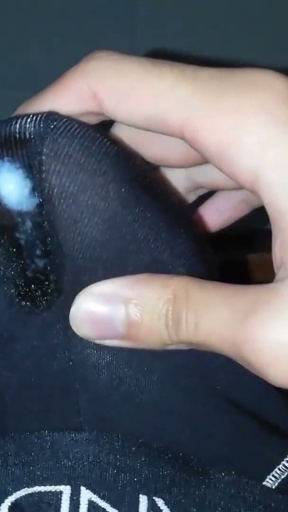 Jerking off my big uncut cock until I cum inside my black underwear and let the cum leak through them - Camilo Brown | Clip 1