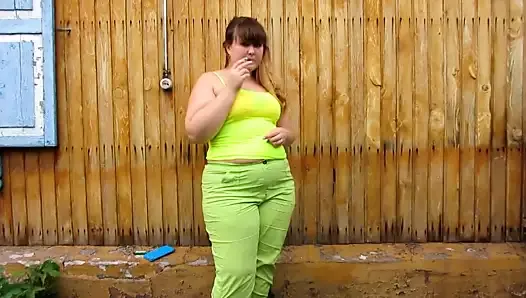 Chubby woman peeing in her pants