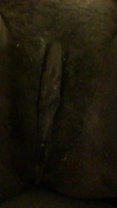 girl plays with her hairy juicy black pussy